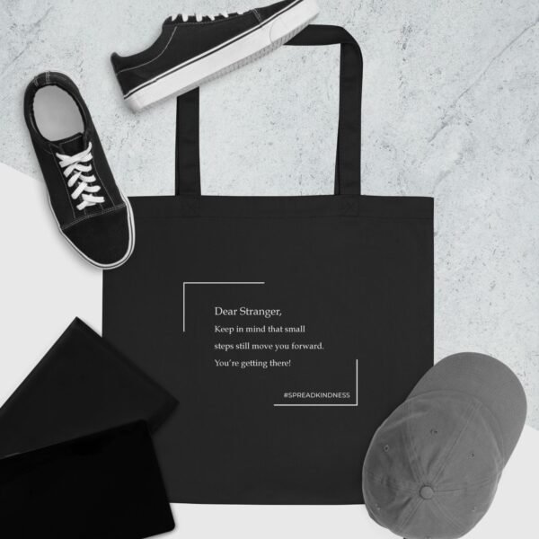 Eco tote bag with the message "Dear Stranger, keep in mind that small steps still move you forward. You're getting there"