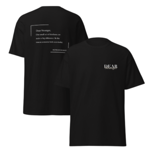 Unisex Black T-Shirt with the message "Dear Stranger, one small act of kindness can make a big difference. Be the reason someone feels seen today!"