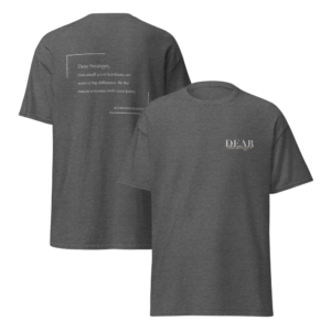 Unisex Dark Heather Grey T-Shirt with the message "Dear Stranger, one small act of kindness can make a big difference. Be the reason someone feels seen today!"