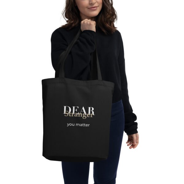 Black Eco Tote bag with the message, "Dear Stranger, you matter"