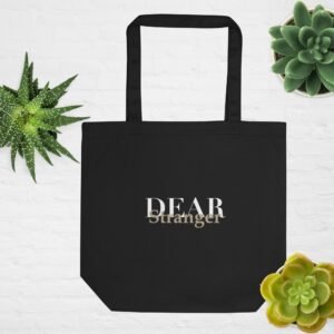 Black Eco Tote bag with the message, "Dear Stranger, one small act of kindness can make a big difference. Be the reason someone feels seen today."