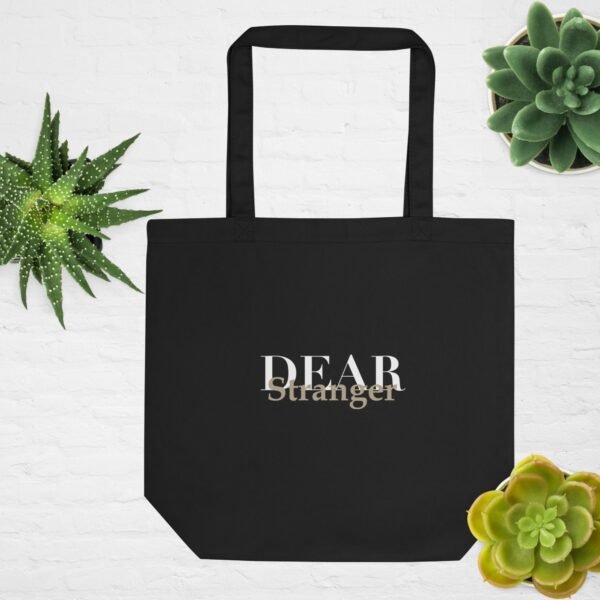 Black Eco Tote bag with the message, "Dear Stranger, one small act of kindness can make a big difference. Be the reason someone feels seen today."
