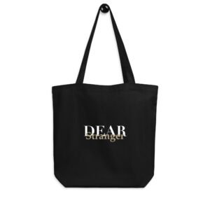 Black Eco Tote bag with the message, "Dear Stranger, your smile could be the reason someone believes in kindness today"