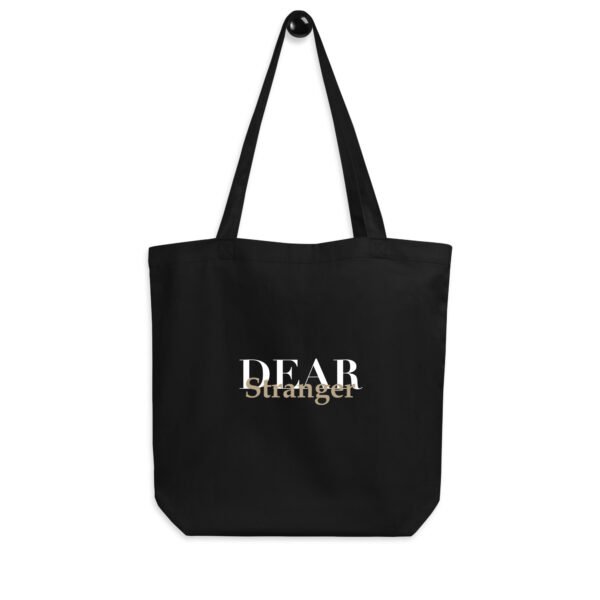 Black Eco Tote bag with the message, "Dear Stranger, your smile could be the reason someone believes in kindness today"