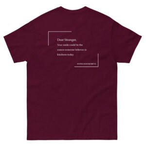 Unisex maroon T-Shirt with the message "Dear stranger, your smile could be the reasons someone believes in kindness today."