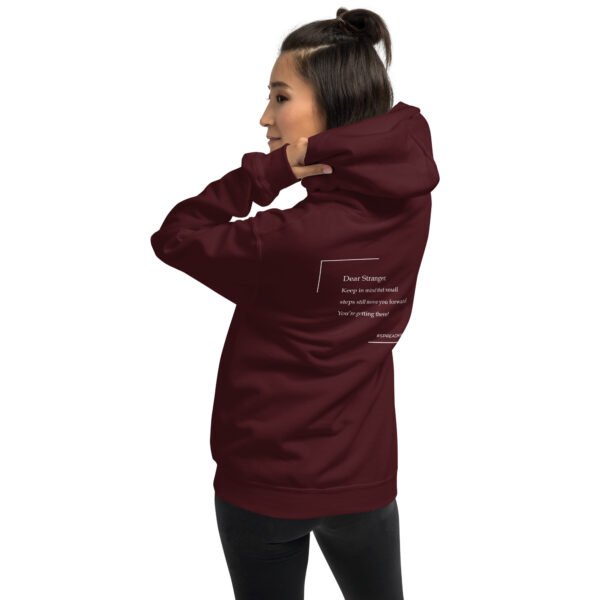 Unisex maroon hoodie with the message "Dear stranger, keep in mind that small steps still move you forward. You're getting there!"