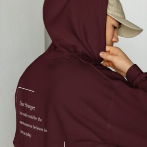 Unisex maroon hoodie with the message "Dear stranger, your smile could be the reasons someone believes in kindness today"