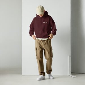 Unisex maroon hoodie with the message "Dear stranger, your smile could be the reasons someone believes in kindness today"