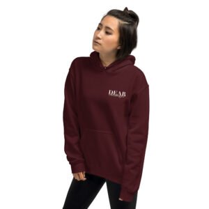 Unisex maroon hoodie with the message "Dear stranger, keep in mind that small steps still move you forward. You're getting there!"