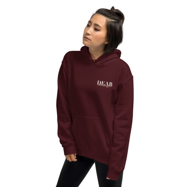 Unisex maroon hoodie with the message "Dear stranger, keep in mind that small steps still move you forward. You're getting there!"