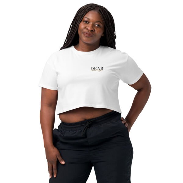 White Crop Top with the message "Dear stranger, your smile could be the reasons someone believes in kindness today."